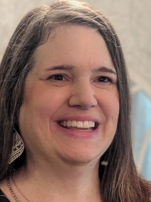Nadine, 52