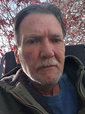 Travis, 63