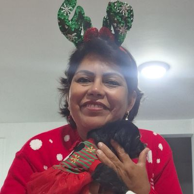 Carmela, 54
