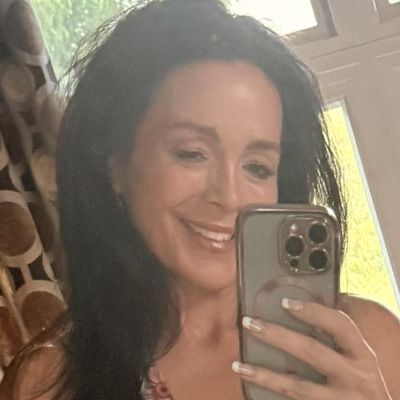 Natalie, 52