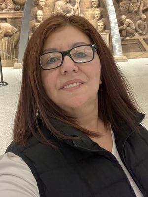 Angela, 56