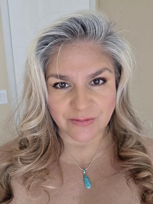 Natalie, 52