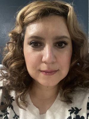Carmela, 44