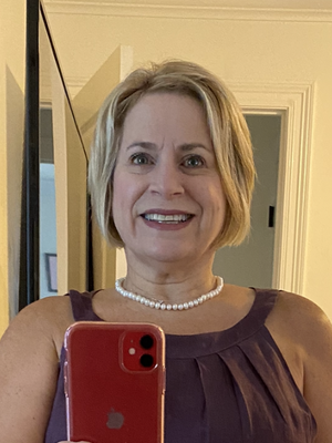 Mitzi, 55